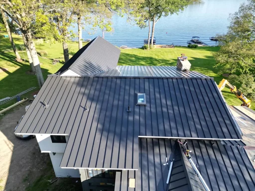 A newly installed standing seam metal roof